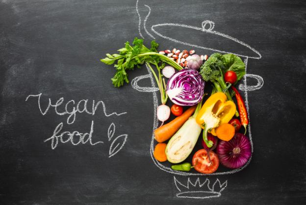 Koukoumi Vegan Hotel vegan food logo