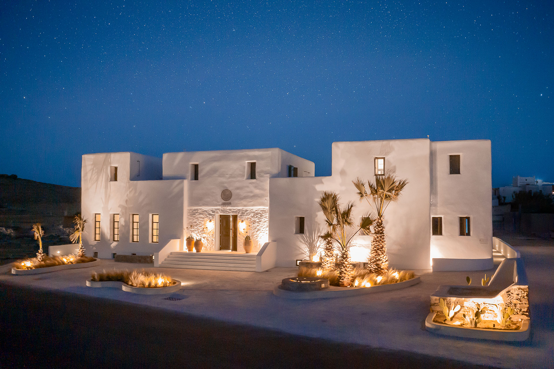 Koukoumi Vegan Hotel exterior at night