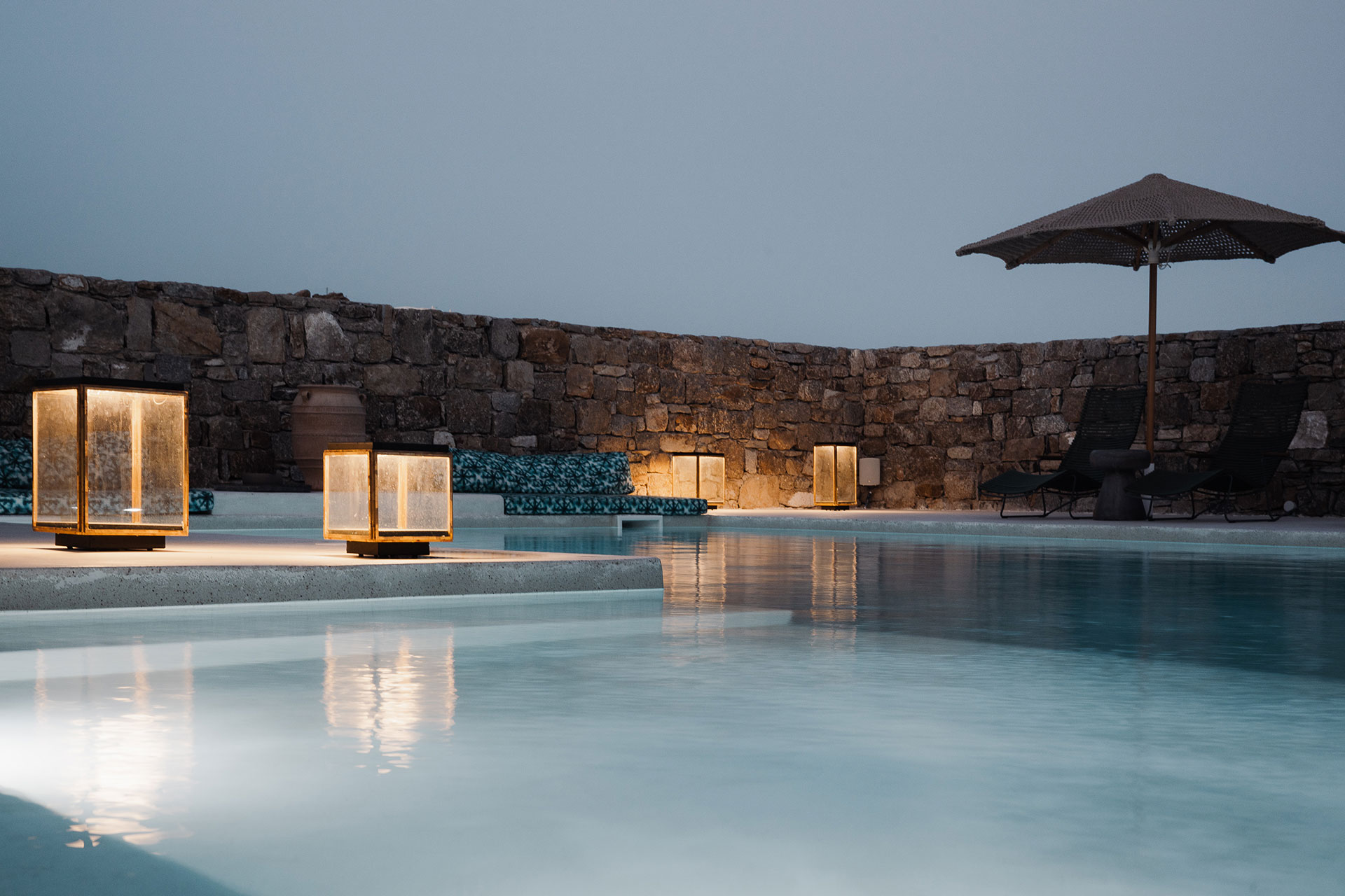 Koukoumi Vegan Hotel pool lit up at night