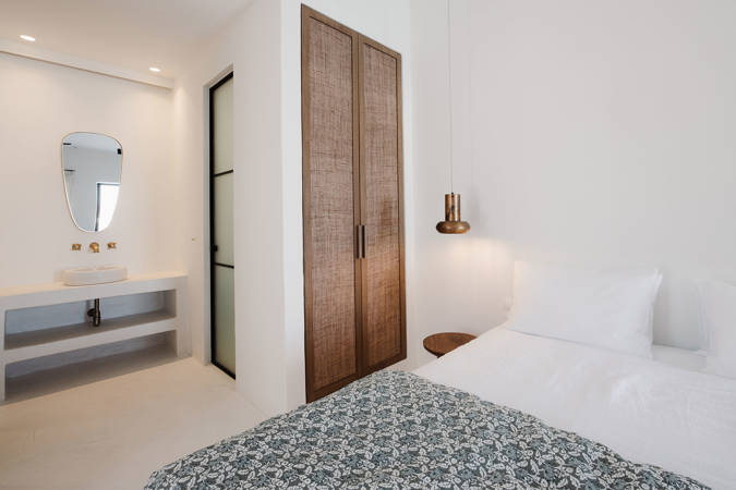 Koukoumi Vegan Hotel koukoumi suite bed and open plan bathroom