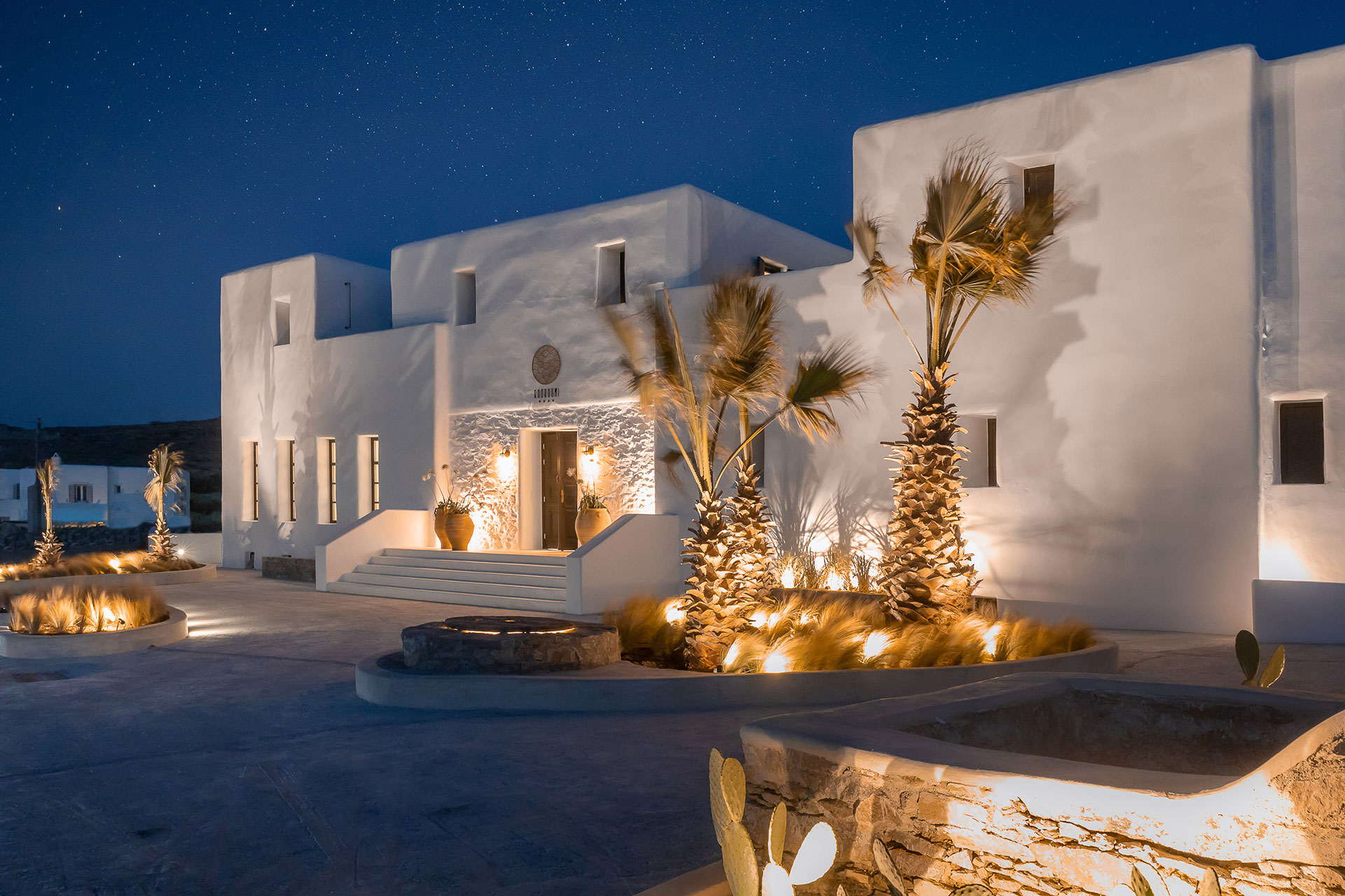Koukoumi Vegan Hotel exterior at night