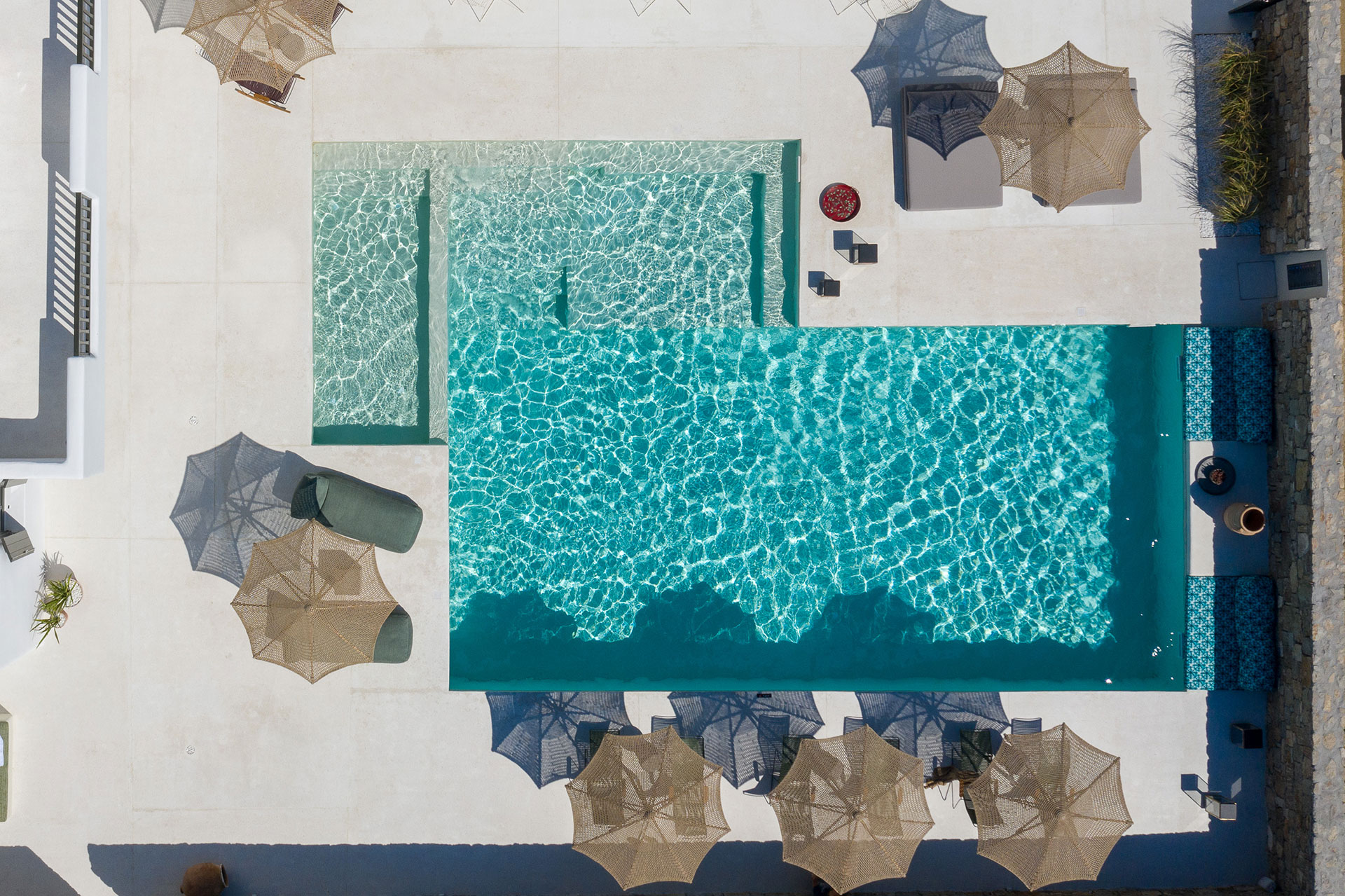Koukoumi Vegan Hotel pool and sunbeds and umbrellas